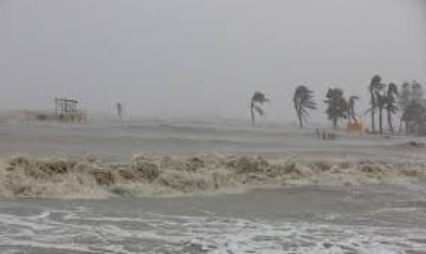 Coastal rains and rough seas as bay depression deepens